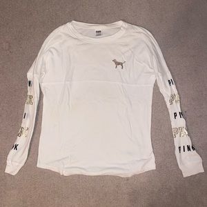 White long sleeve shirt from PINK with gold detail.